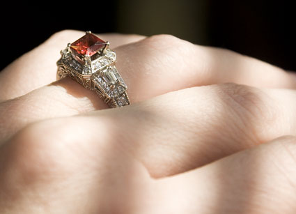 engagement ring with garnet setting