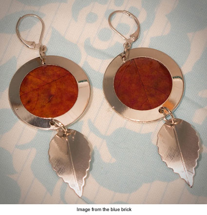 earrings made from preserved leaves framed in silver