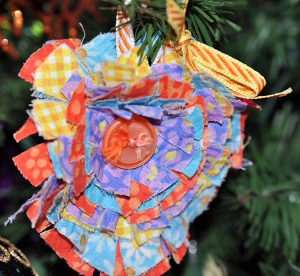 Fabric scaps, buttons and ribbon make pretty and colorful ornaments.