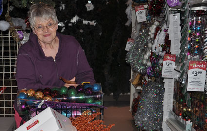 Mom looking at all the garland choices.