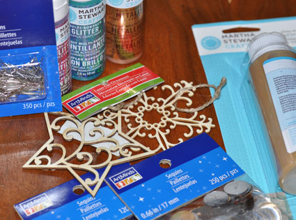 Craft supplies to create handmade tree ornaments.