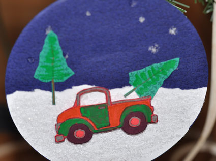 Create ornaments from upcycled CDs using scrapbook paper, rubber stamps and embellishments.