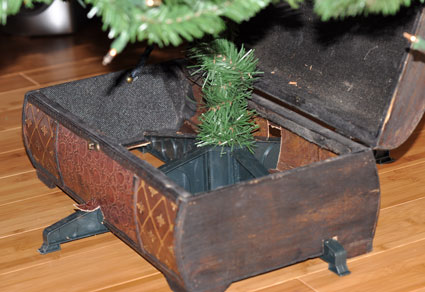 This repurposed storage box makes a great treasure box tree skirt!